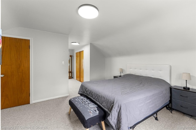 3135 Raymond Ave, Dearborn, MI 48124 - carpeted bedroom with vaulted ceiling and baseboards
