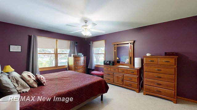 5475 George St, Saginaw, MI 48603 - bedroom featuring light carpet and a ceiling fan