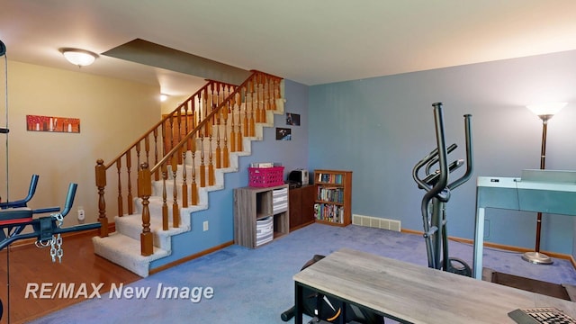 5475 George St, Saginaw, MI 48603 - exercise area with baseboards and carpet floors