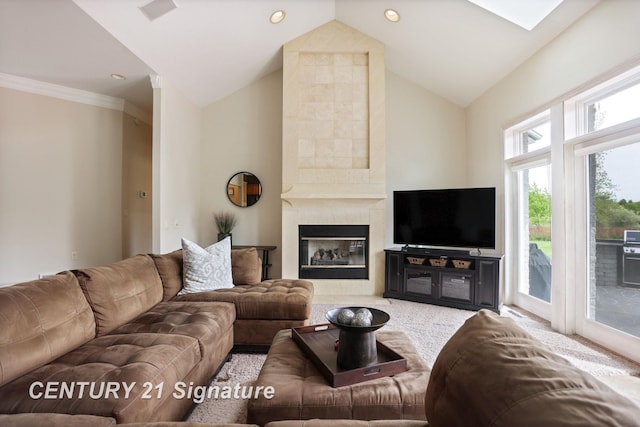 2170 Chestnut Rdg, Saginaw, MI 48609 - living area featuring lofted ceiling, recessed lighting, a tiled fireplace, and ornamental molding