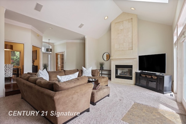 2170 Chestnut Rdg, Saginaw, MI 48609 - carpeted living room featuring a premium fireplace, ornamental molding, vaulted ceiling, recessed lighting, and baseboards