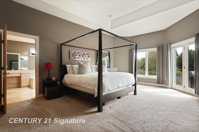2170 Chestnut Rdg, Saginaw, MI 48609 - carpeted bedroom featuring access to outside, ensuite bathroom, and baseboards