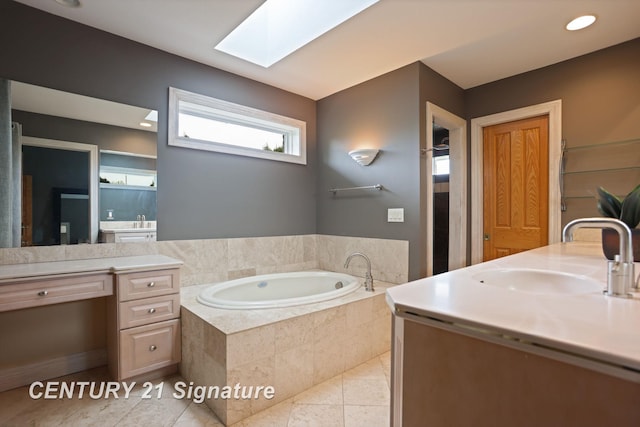 2170 Chestnut Rdg, Saginaw, MI 48609 - full bathroom featuring vanity, a garden tub, a skylight, tile patterned flooring, and recessed lighting