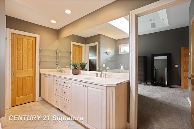 2170 Chestnut Rdg, Saginaw, MI 48609 - bathroom with double vanity, recessed lighting, and tile patterned floors