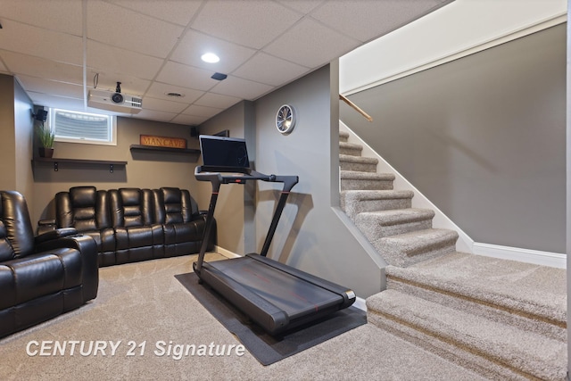 2170 Chestnut Rdg, Saginaw, MI 48609 - workout area featuring carpet flooring, a paneled ceiling, and baseboards