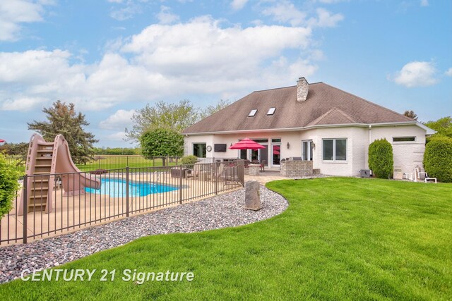 2170 Chestnut Rdg, Saginaw, MI 48609 - view of pool featuring a water slide and a patio area