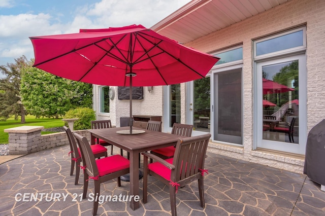 2170 Chestnut Rdg, Saginaw, MI 48609 - view of patio featuring outdoor dining space