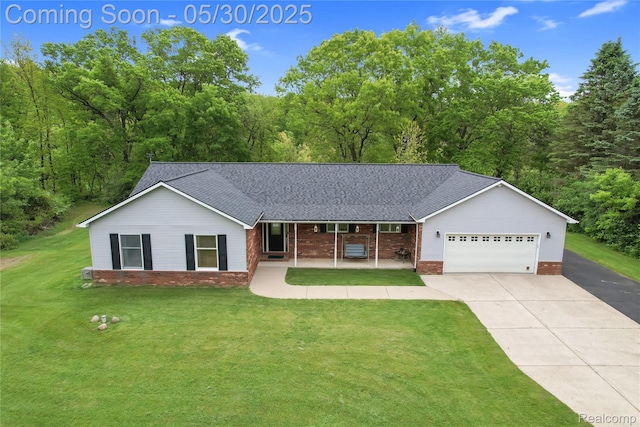 9587 Harmon Ln, South Lyon, MI 48178 - ranch-style home featuring covered porch, roof with shingles, a front lawn, concrete driveway, and an attached garage