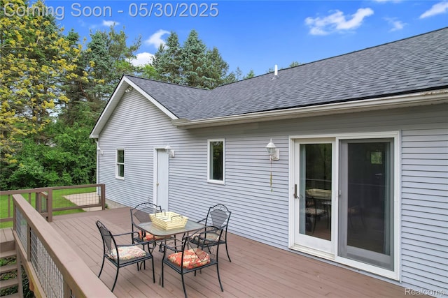 9587 Harmon Ln, South Lyon, MI 48178 - wooden terrace featuring outdoor dining area