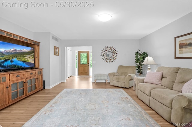9587 Harmon Ln, South Lyon, MI 48178 - living room with light wood finished floors and baseboards