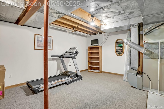 9587 Harmon Ln, South Lyon, MI 48178 - exercise area featuring carpet, baseboards, and heating unit