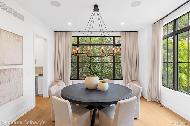 608 Stanley Blvd, Birmingham, MI 48009 - dining room with a chandelier, light wood-style floors, baseboards, and recessed lighting