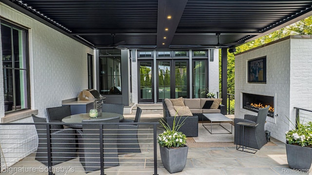 608 Stanley Blvd, Birmingham, MI 48009 - view of patio featuring area for grilling, an outdoor living space with a fireplace, outdoor dining area, ceiling fan, and french doors