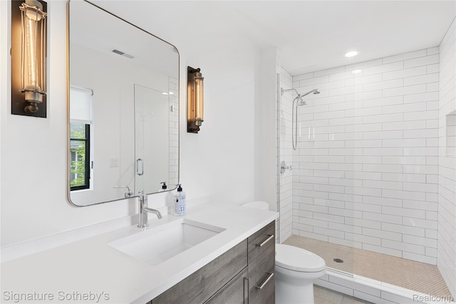 608 Stanley Blvd, Birmingham, MI 48009 - bathroom with vanity, a shower stall, toilet, and recessed lighting