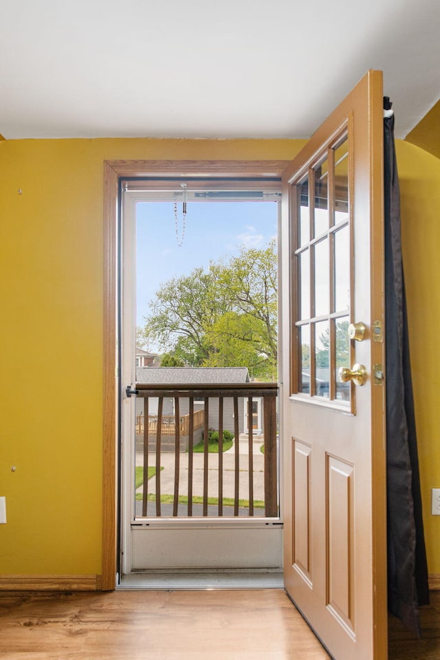 222 Oak St, South Haven, MI 49090 - entryway featuring wood finished floors and baseboards