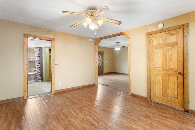 222 Oak St, South Haven, MI 49090 - spare room featuring ceiling fan, wood finished floors, baseboards, and a smoke detector