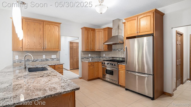5305 Fern Dr, Fenton, MI 48430 - kitchen with appliances with stainless steel finishes, wall chimney range hood, a sink, light stone countertops, and tasteful backsplash