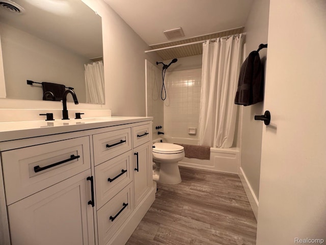 51174 Johns Dr Unit 22, Chesterfield, MI 48047 - full bathroom featuring vanity, shower / tub combo with curtain, and wood finished floors