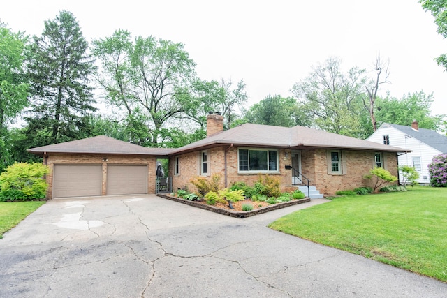 1419 Vassar Dr, Kalamazoo, MI 49001 - ranch-style house with brick siding, driveway, a front lawn, and a garage