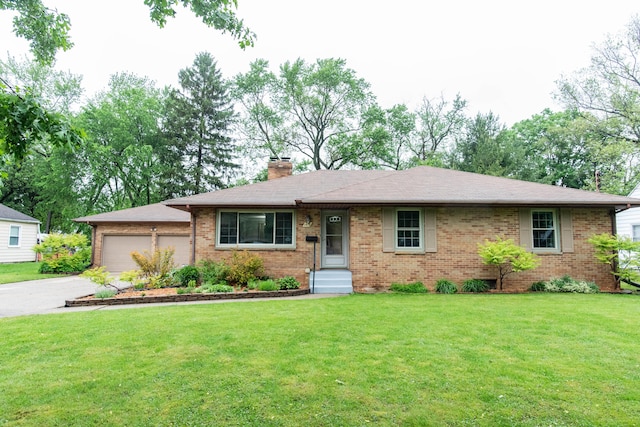 1419 Vassar Dr, Kalamazoo, MI 49001 - single story home featuring brick siding, a chimney, driveway, and a front lawn