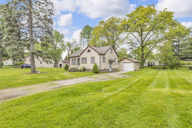 870 Bryant Ave, Jackson, MI 49202 - view of front of home with dirt driveway, an outbuilding, a garage, and a front yard