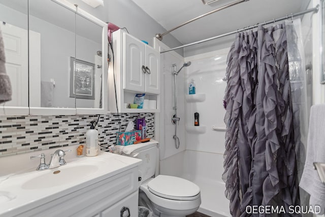 1070 Morningside St, Muskegon, MI 49442 - full bath with tasteful backsplash, toilet, a shower with curtain, and vanity