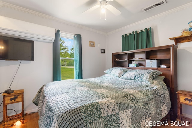 1070 Morningside St, Muskegon, MI 49442 - bedroom with ornamental molding, wood finished floors, a wall unit AC, and a ceiling fan