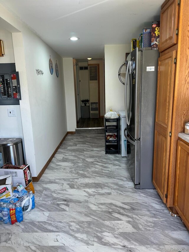 6111 Loud Dr, Oscoda, MI 48750 - hall with electric panel and baseboards