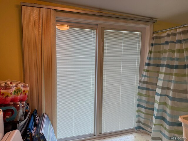 6111 Loud Dr, Oscoda, MI 48750 - full bathroom with a shower with curtain