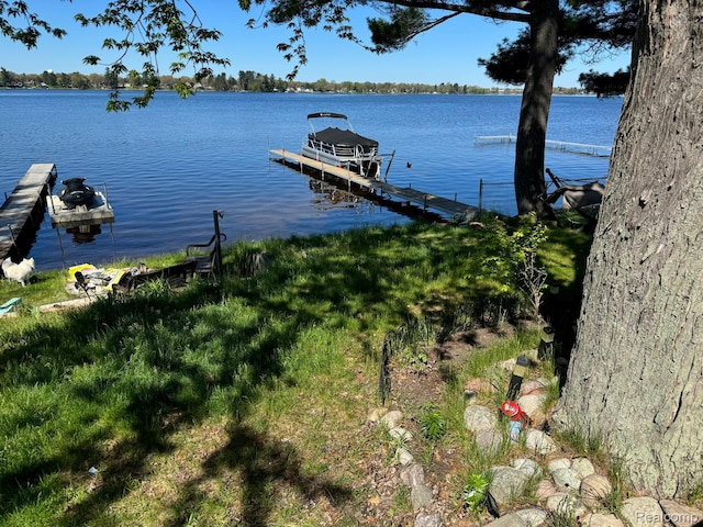 6111 Loud Dr, Oscoda, MI 48750 - dock with a water view