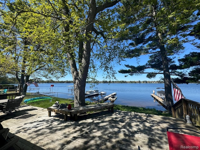 6111 Loud Dr, Oscoda, MI 48750 - dock area featuring a water view