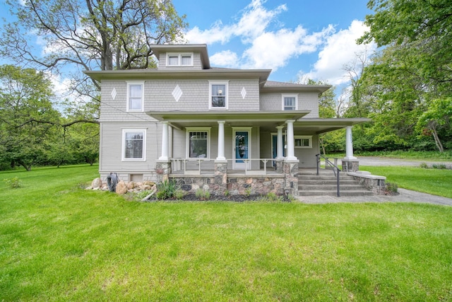 7331 Browns Lake Rd, Jackson, MI 49201 - traditional style home with a porch and a front yard