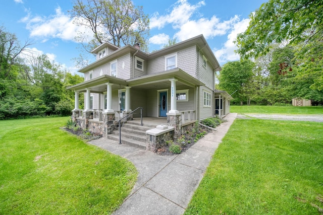 7331 Browns Lake Rd, Jackson, MI 49201 - view of front of home featuring covered porch, a chimney, and a front lawn