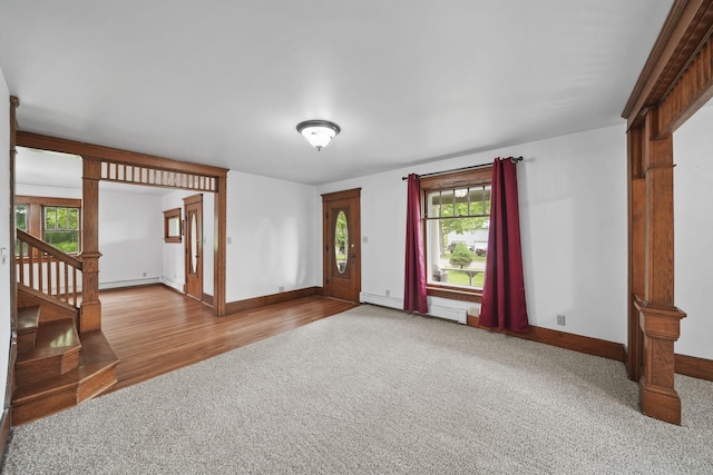 7331 Browns Lake Rd, Jackson, MI 49201 - carpeted entryway with baseboards, healthy amount of natural light, and baseboard heating
