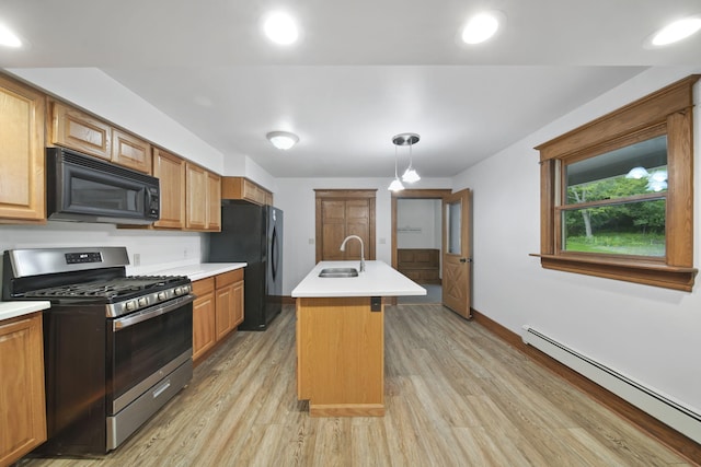 7331 Browns Lake Rd, Jackson, MI 49201 - kitchen featuring black appliances, baseboard heating, a sink, light countertops, and baseboards
