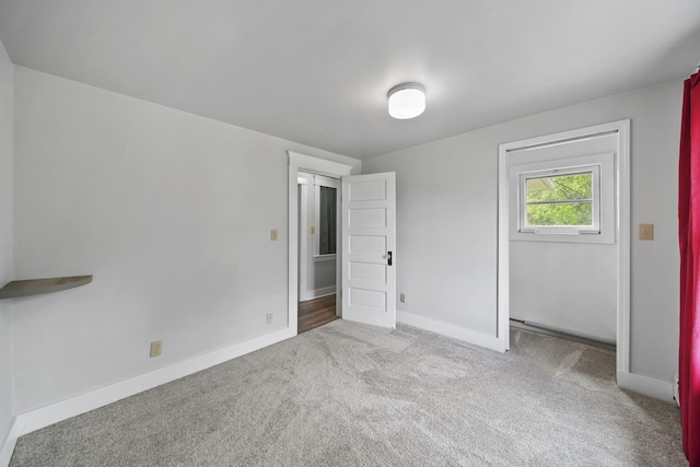 7331 Browns Lake Rd, Jackson, MI 49201 - unfurnished bedroom featuring carpet flooring and baseboards