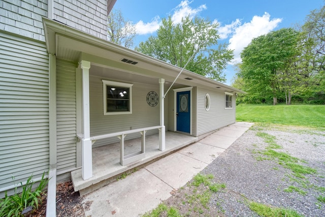 7331 Browns Lake Rd, Jackson, MI 49201 - property entrance featuring a lawn