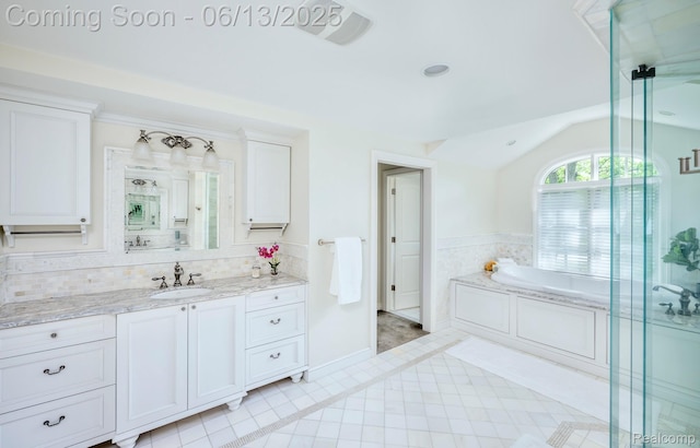 3320 Morningview Ter, Bloomfield Hills, MI 48301 - bathroom featuring vaulted ceiling, vanity, a garden tub, an enclosed shower, and tile patterned flooring