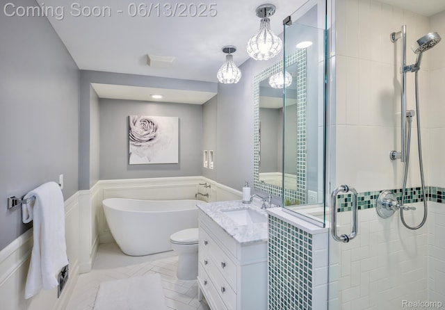 3320 Morningview Ter, Bloomfield Hills, MI 48301 - bathroom with a stall shower, vanity, a freestanding bath, a wainscoted wall, and tile patterned flooring