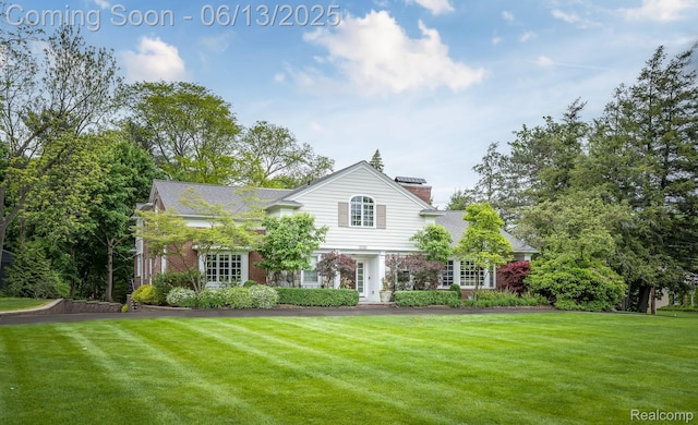 3320 Morningview Ter, Bloomfield Hills, MI 48301 - view of front of property featuring a front lawn, a chimney, and brick siding