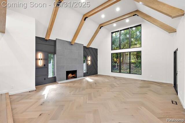 1367 W Long Lake Rd, Bloomfield Hills, MI 48302 - unfurnished living room featuring high vaulted ceiling, baseboards, recessed lighting, a tiled fireplace, and beam ceiling