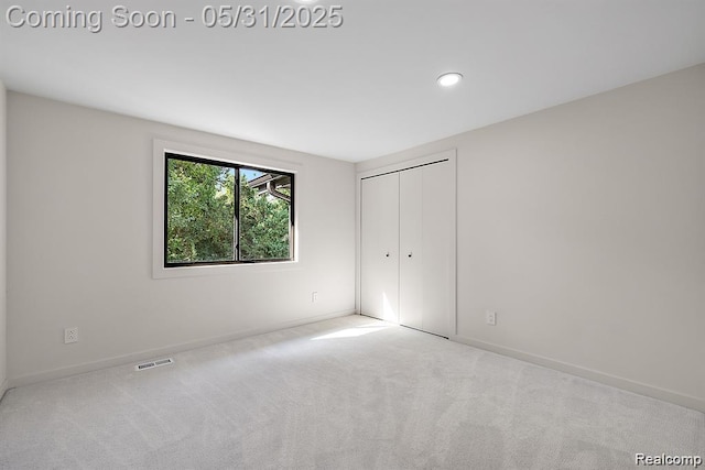 1367 W Long Lake Rd, Bloomfield Hills, MI 48302 - unfurnished bedroom with carpet flooring, baseboards, a closet, and recessed lighting