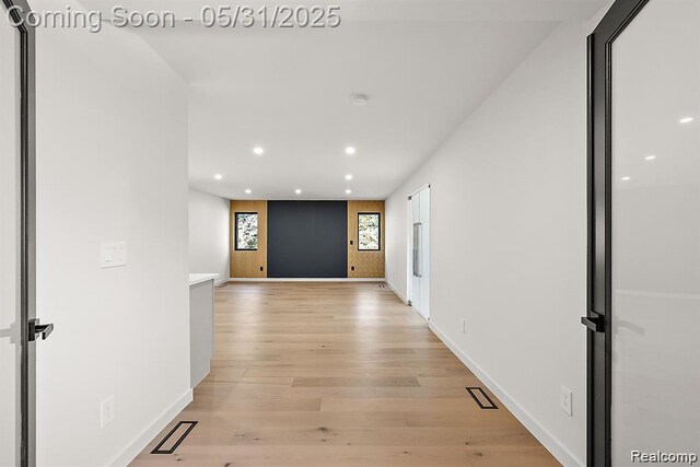 1367 W Long Lake Rd, Bloomfield Hills, MI 48302 - hallway featuring recessed lighting, light wood finished floors, and baseboards