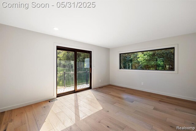 1367 W Long Lake Rd, Bloomfield Hills, MI 48302 - empty room featuring light wood finished floors, baseboards, and recessed lighting