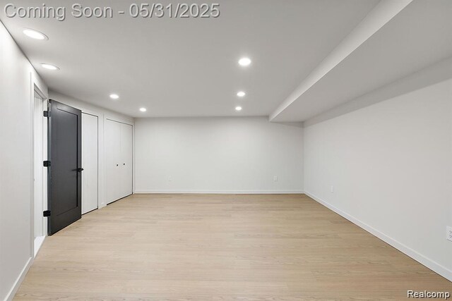 1367 W Long Lake Rd, Bloomfield Hills, MI 48302 - finished basement featuring recessed lighting, light wood-style floors, and baseboards