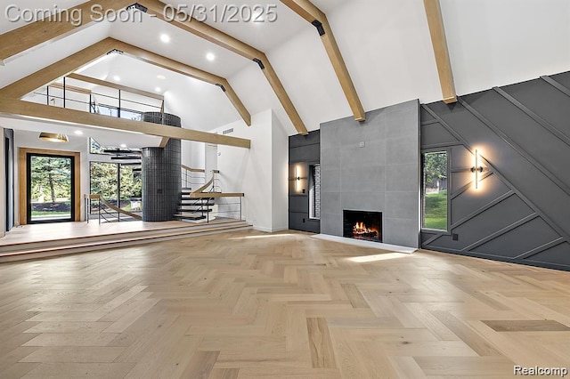 1367 W Long Lake Rd, Bloomfield Hills, MI 48302 - unfurnished living room featuring high vaulted ceiling, healthy amount of natural light, beamed ceiling, a tiled fireplace, and recessed lighting