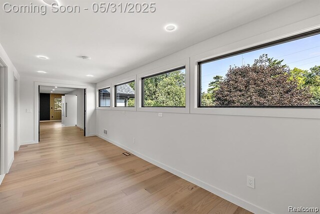 1367 W Long Lake Rd, Bloomfield Hills, MI 48302 - unfurnished room featuring light wood-type flooring, baseboards, recessed lighting, and a smoke detector