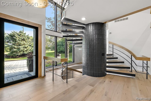 1367 W Long Lake Rd, Bloomfield Hills, MI 48302 - stairway with wood finished floors and baseboards