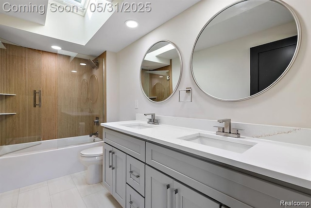 1367 W Long Lake Rd, Bloomfield Hills, MI 48302 - bathroom with double vanity, toilet, combined bath / shower with glass door, and recessed lighting