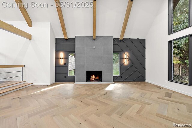 1367 W Long Lake Rd, Bloomfield Hills, MI 48302 - unfurnished living room featuring high vaulted ceiling, baseboards, beamed ceiling, and a tile fireplace